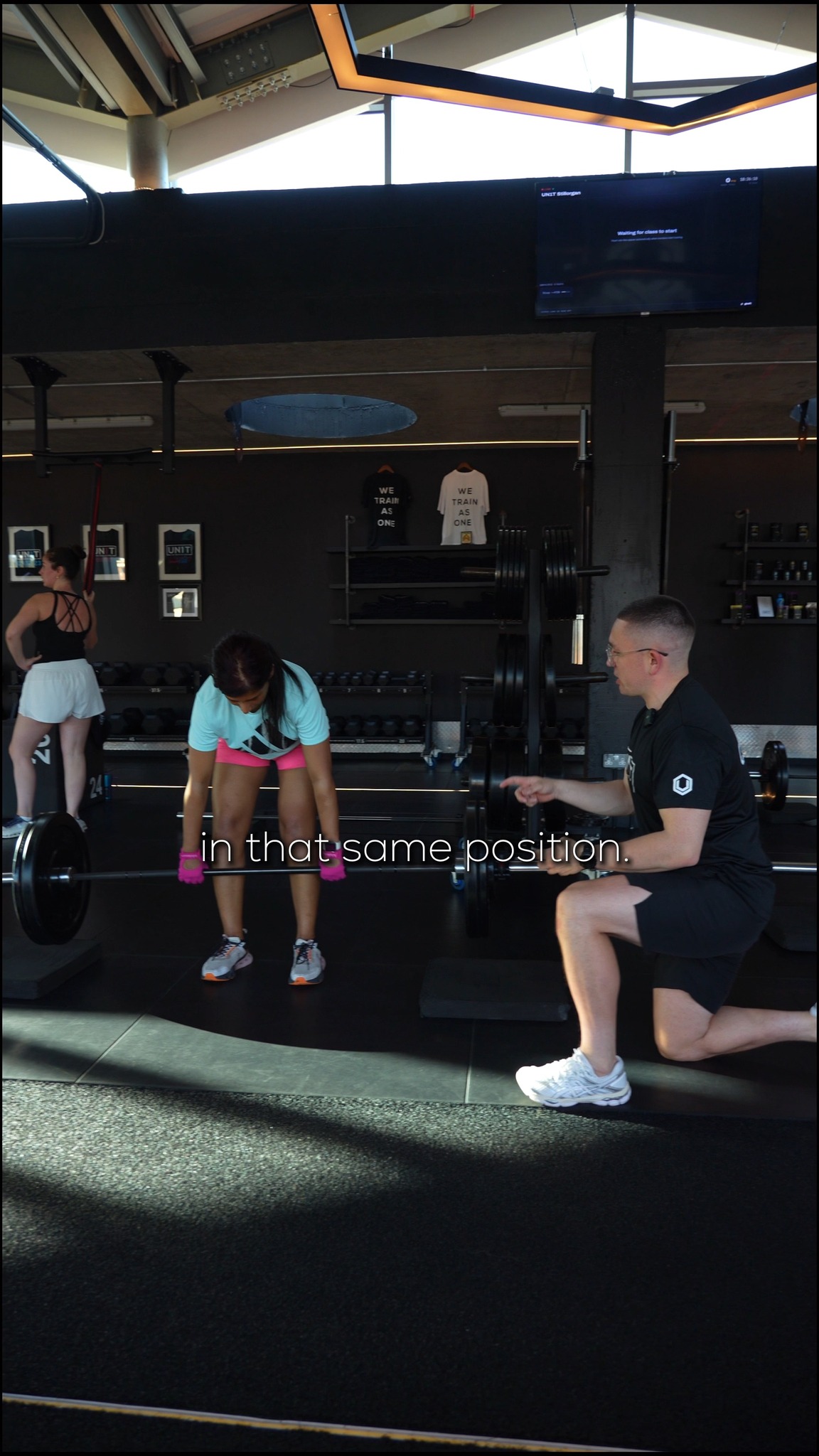 Nobody lifts alone here. Every session, a coach beside you making sure the movement is right before the weight goes up.